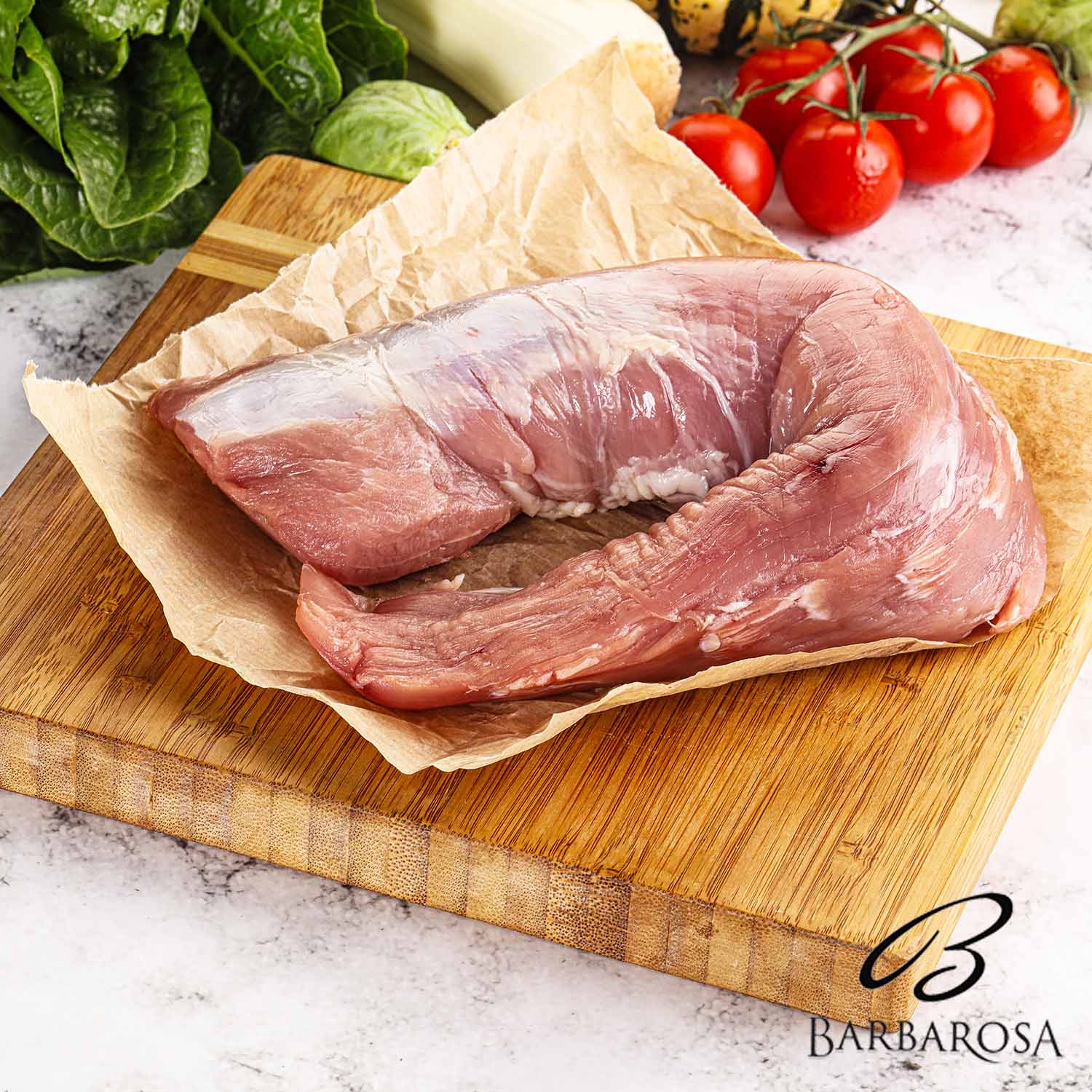 Uncooked raw pork tenderloin with spices