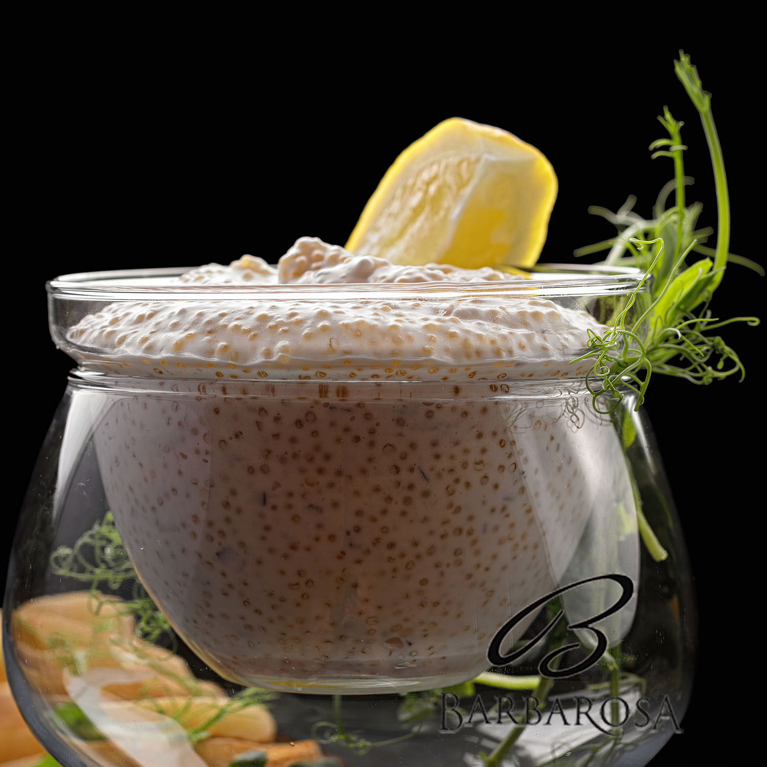 Pike caviar with toast on a wooden board, close-up